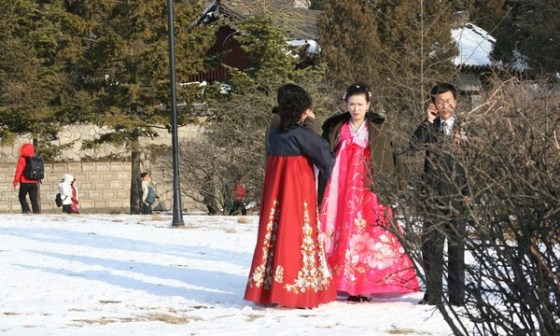 Image: wedding party in a snowy park