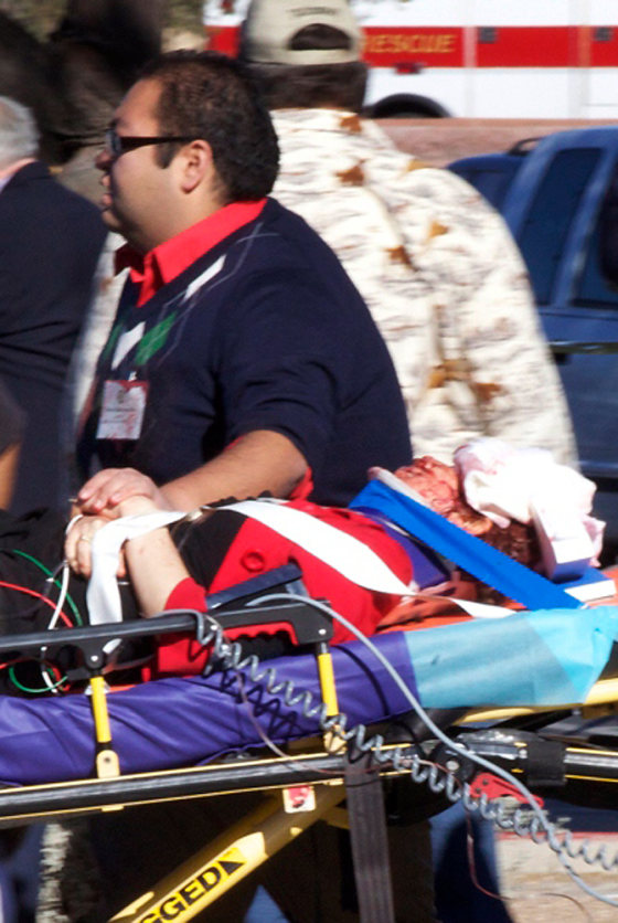 Image: Daniel Hernandez assists Gabrielle Giffords