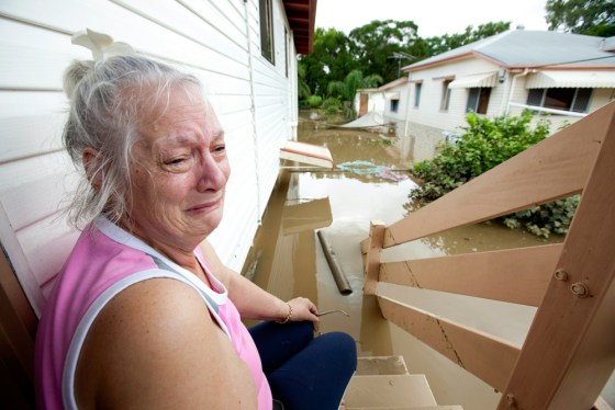 Image: Resident Anne Smart sits on the step of Ipswich