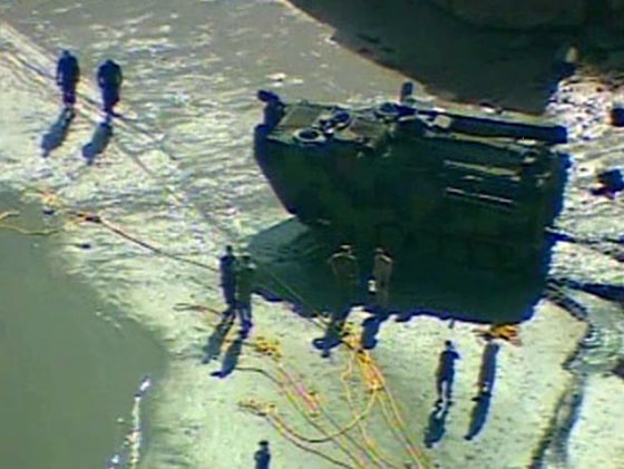 Marines at Camp Pendleton, Calif., work on a rescue mission Friday after an amphibious assault vehicle sinks.