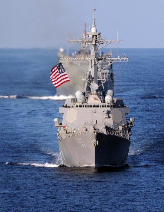 The guided-missile destroyer USS Halsey takes lead in formation for the Abraham Lincoln Carrier Strike Group and the French navy aircraft carrier Charles De Gaulle Strike Group on Dec. 10. 