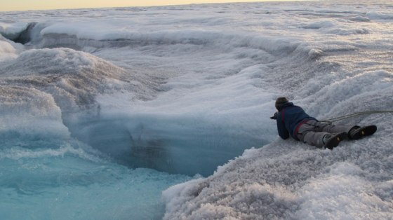 Image: Meltwater flows into Greenland ice