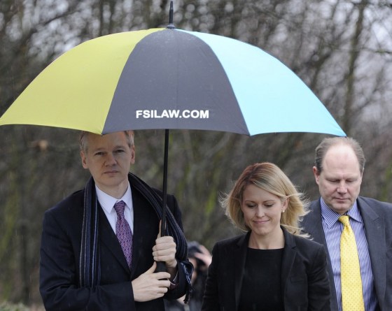 Image: WikiLeaks founder Julian Assange arrives with his lawyer for the final day of his extradition hearing at Belmarsh Magistrates' Court in London