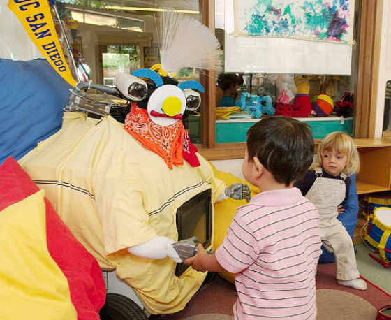 Image: RUBI robot with kids