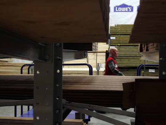 Image: An employee at a Lowe's store in Massachusettes