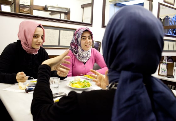 From left to right, Funda Altintas, Esma Bendez and Fatma Betul Yumuk talk about their futures on a recent night out in Istanbul.