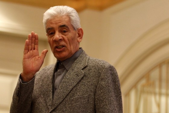 Image: Libya's Foreign Minister Moussa Koussa is seen speaking during a news conference at a hotel housing the foreign press in Tripoli in this March 7, 2011 file photograph.