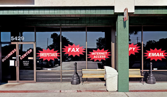 The Cyber City Internet Cafe in Winter Park, Fla., offers slot-machine-style games like Wheel O' Treasure, Prize Is Right and Cobra Cash — and a fax machine. Despite police raids and the occasional prosecution, 'Internet sweepstakes cafe' businesses continue to spread, ballooning into a multibillion-dollar industry. 