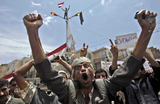 Image: An anti-government protestor, reacts during a demonstration demanding the resignation of of Yemeni President Ali Abdullah Saleh, in Sanaa, Yemen