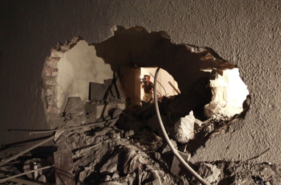 Image: Damage Damage which the Libyan government said was caused by a coalition air strike is seen at the house of Saif Al-Arab Gaddafi in Tripoli