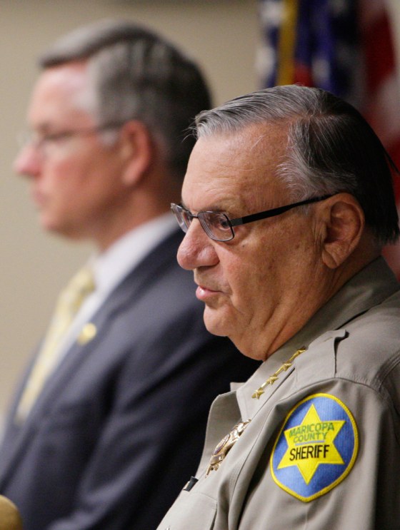 Image: Maricopa County Sheriff Joe Arpaio, right, with Maricopa County Attorney Bill Montgomery, announce at a news conference that a Maricopa County Sheriff's deputy and two detention officers have been arrested.