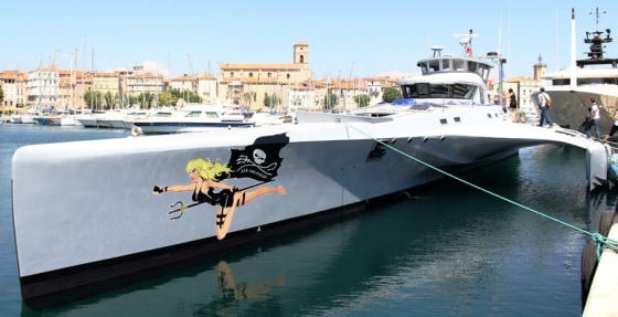 The "Brigitte Bardot" is seen at anchor on the coast of France.