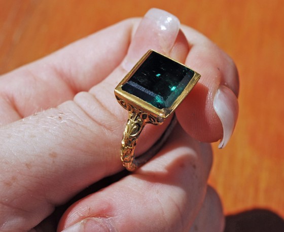 Image:  ancient gold ring with a rectangular cut emerald