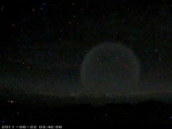 Two telescopes in Hawaii caught this mysterious burst in the sky on film. The sight is likely that of a test missile venting fuel in the upper atmosphere.