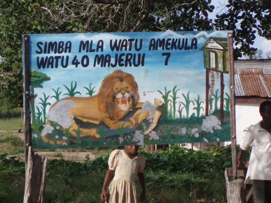 A sign commemorates 40 victims killed by a man-eating lion in the Rufiji District of Tanzania in 2005.