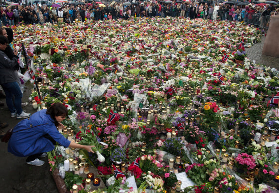 Image: Flowers and condolences surround the outside of Oslo Cathedral after Anders Behring Breivik appeared in a closed court on Monday in Oslo