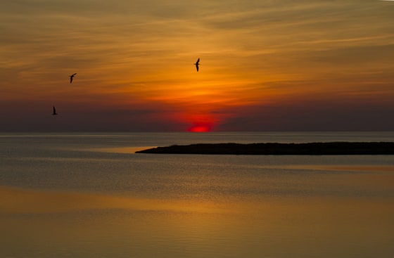 The last glow of sunset over the beaches and seacoast of the Outer Banks, N.C.