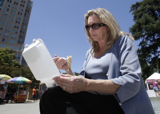 Image: D'Anne Ousley has lunch out of a plastic foam container