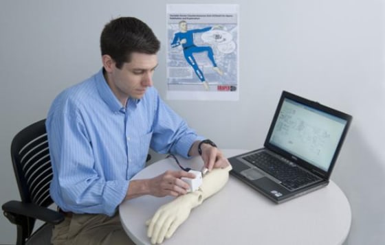 Draper Lab group has partnered on a spacesuit project with scientists at NASA's Johnson Space Center and the Massachusetts Institute of Technology. They plan to first create a prototype for a spacesuit arm by 2012.