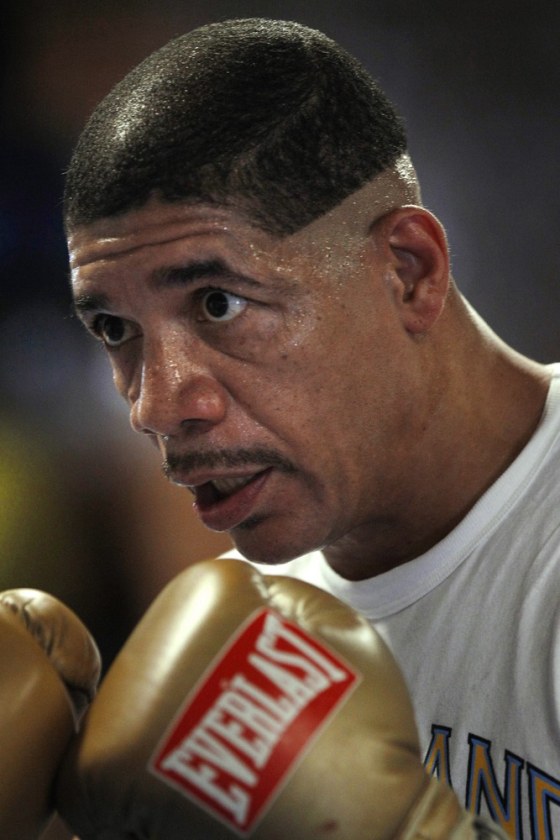 Exonerated of murder, boxer makes his debut at 52