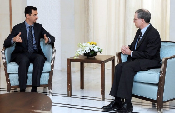 Image: US ambassador Robert Ford, right with Syrian President Bashar Assad in Janurary.