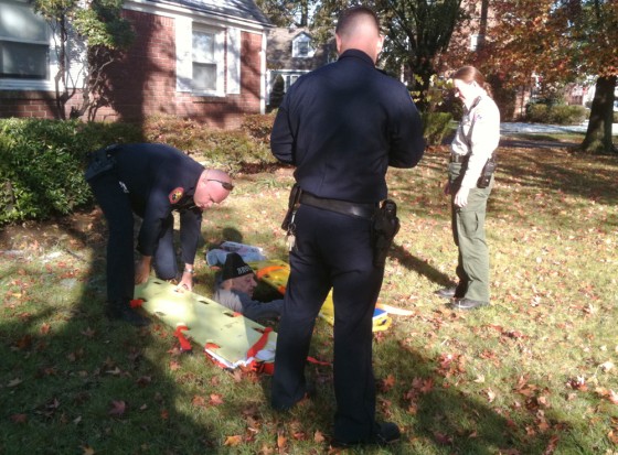 Image: Michael Ciron is rescued from an 8-foot hole in front of his Oceanside, N.Y. home.