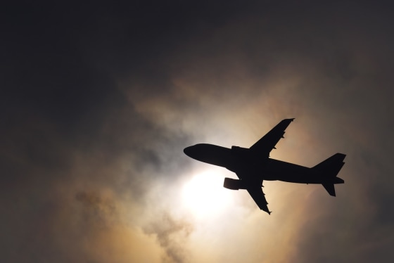 Image: A passenger plane shortly after takeoff at the Geneva international airport