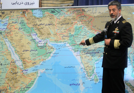 Image: Iran's Navy Commander Sayari points at a map during a news conference in Tehran