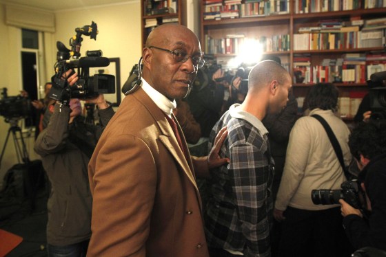 Image: George Wright leaves his lawyers' office after attending a news conference in Lisbon