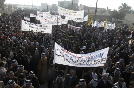 Image: Residents gather during a demonstration in Hilla