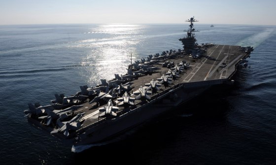 Image: US Navy handout photo of the USS John C. Stennis aircraft carrier in the Straits of Hormuz