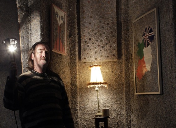 Image: Artist Frank Buckley poses in the house he has built out of 1.4 billion euros in decommissioned euro notes from the Irish Central Bank's mint, in Dublin