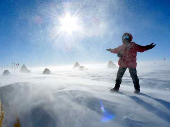 The search-for-meteorites program places researchers on the ice to live in base camp conditions of wind and snow.