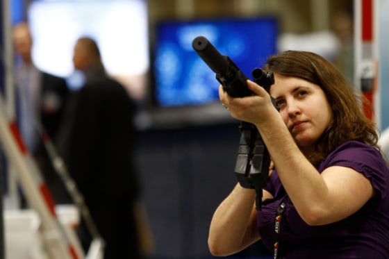 An attendee at the Border Security Expo last week in Phoenix checks a vendor's offering. 