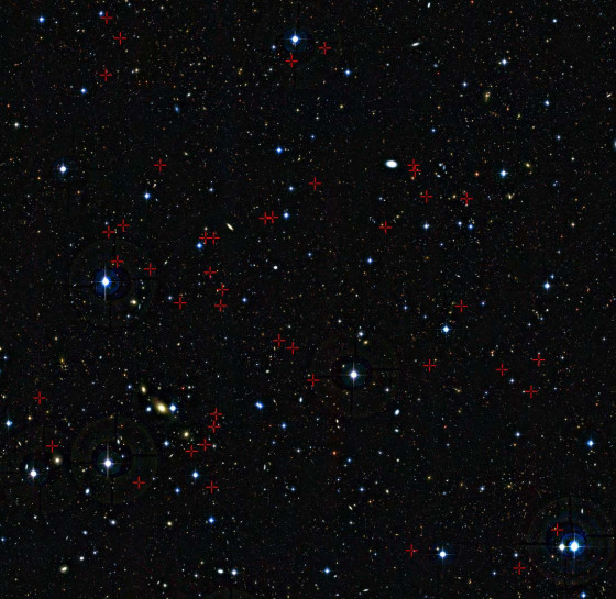 Each of the galaxies, marked by the red crosses, were seen as they were between 3 billion and 5 billion years after the Big Bang. These galaxies, located in the constellation of Cetus (The Sea Monster), were studied in detail using the European Southern Observatory's Very Large Telescope.