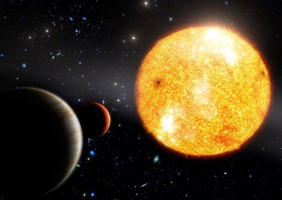 An artist’s impression of the star HIP 11952 and its two Jupiter-like planets. Astronomers think this alien planetary system is about 12.8 billion years old.
