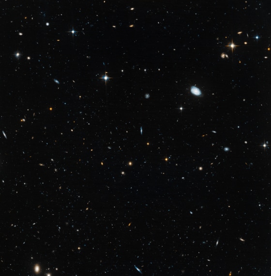 Astronomers used the NASA/ESA Hubble Space Telescope to unmask the dim, star-starved dwarf galaxy Leo IV. This image was released on Tuesday.