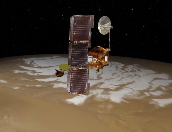 NASA's Mars Odyssey spacecraft passes above Mars' south pole in this artist's concept illustration. The spacecraft has been orbiting Mars since October 24, 2001.