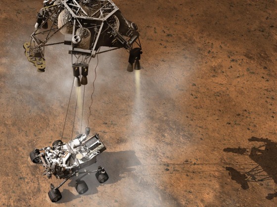 This artist's concept depicts the Sky Crane lowering NASA's Curiosity rover onto the Martian surface.