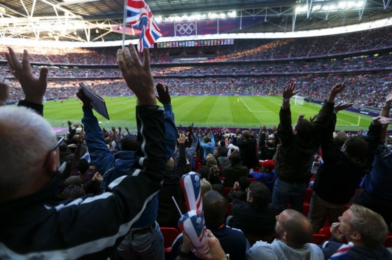 Image: Britain's supporters watch their men's preliminary first round Group A soccer match against UAE at the London 2012 Olympic Games in the Wembley Stadium in London