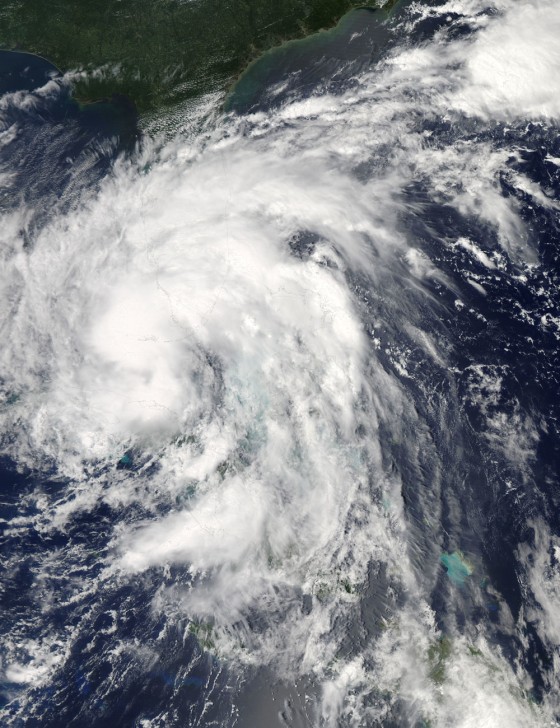 NASA's Aqua satellite passed over Tropical Storm Isaac on Sunday at 2:15 p.m. EDT. When it was over Florida and Cuba, the MODIS instrument captured this visible image of the storm.