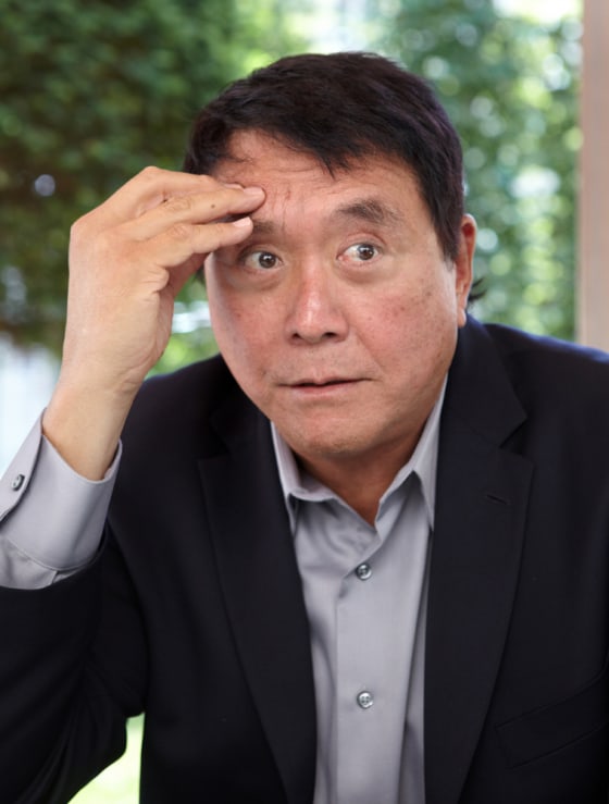 Image: U.S. businessman and writer Robert Toru Kiyosaki presents his book 'Unfair Advantage: The Power of Financial Education' on June 17, 2011