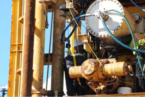 This photo of a Transocean employee working on the failed BP blowout preventer was among the evidence submitted by the U.S. Chemical Safety Board.