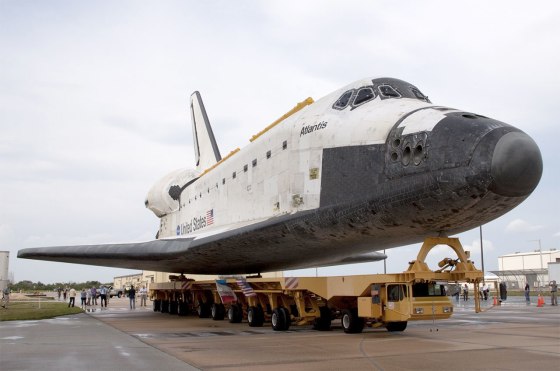 Space shuttle Atlantis moves on the Orbiter Transporter System (OTS) at NASA's Kennedy Space Center in Florida. The same OTS will be used to deliver Atlantis to the Kennedy Space Center Visitor Complex on Nov. 2.