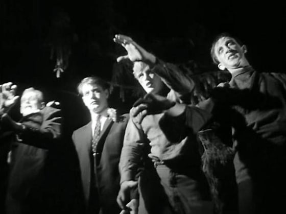 Zombies on the march in a scene from "Night of the Living Dead," George Romero's 1968 film.