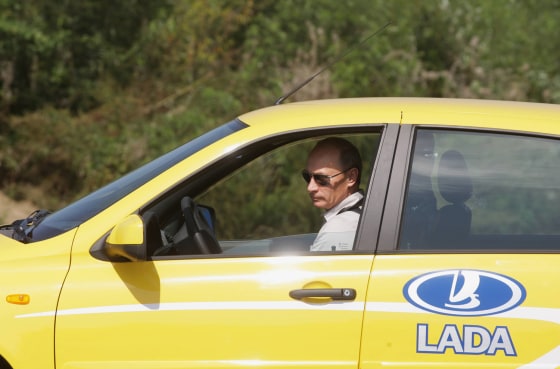 Vladimir Putin drives a Russian-made Lada Kalina