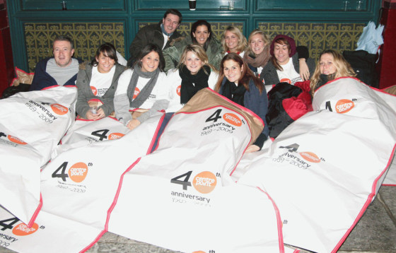 ImageL Sleepers waking up at 6 a.m. after Sleep Out 2008 on Nov. 14, 2008.