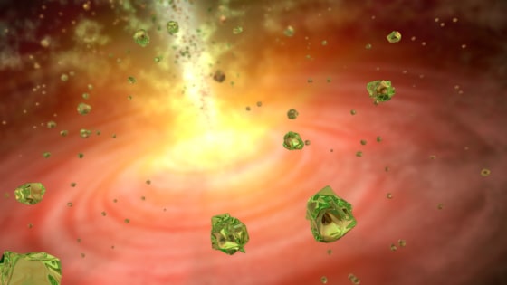 An artist's illustration of green crystal rain, made up of the mineral olivine, falling onto the infant star HOPS-68 from its surrounding cloud of gas and dust. 
