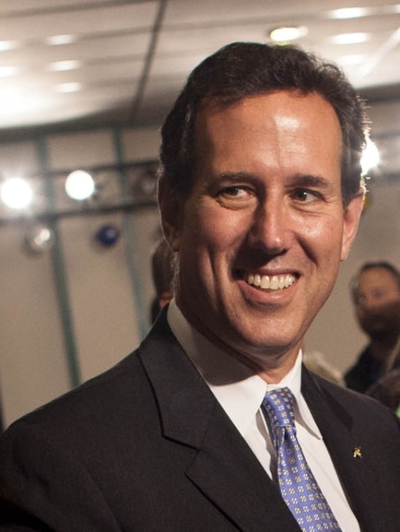 Image: Republican presidential candidate and former U.S. Senator Rick Santorum greets supporters after he addressed supporters at a rally at Lakeshore Lanes in Sheboygan