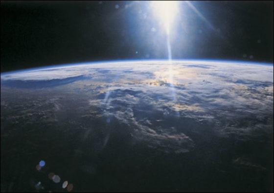 NASA/Getty Images | The Mother Ship This NASA photo shows the Earth from space. If life arose not just once, but multiple times on Earth, \"life as we don't know it\" could be here on our own planet, says astrophysicist Paul Davies. And if it's found, the chances for life elsewhere in the universe are sky-high.